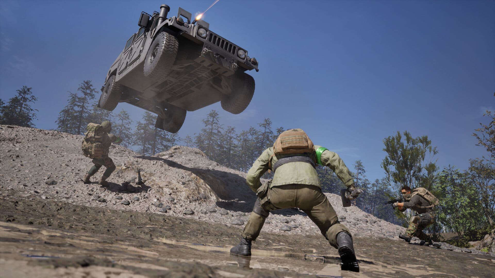 A Humvee jumps a ridge over infantry advancing on a dirt slope