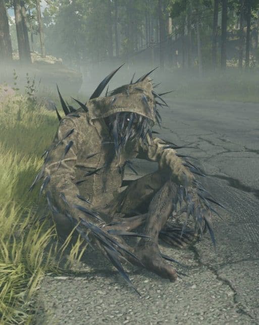 A Distorted crouched on a cracked road, its body bristling with sharp black growths