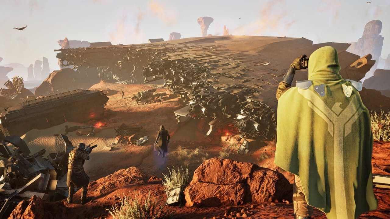 A group watches a sandworm burst through a crowd of enemies on the open sand in Dune: Awakening