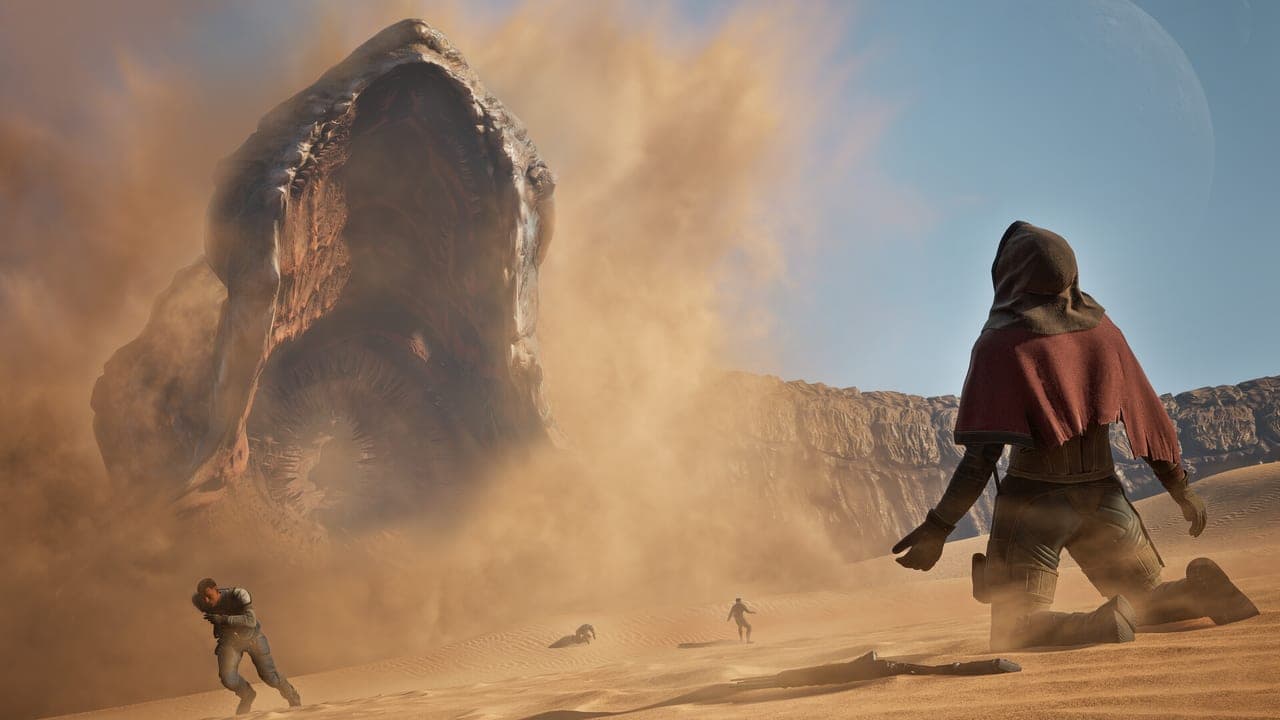 A lone traveller in a red cloak faces a sandworm rising from the dunes in Dune: Awakening