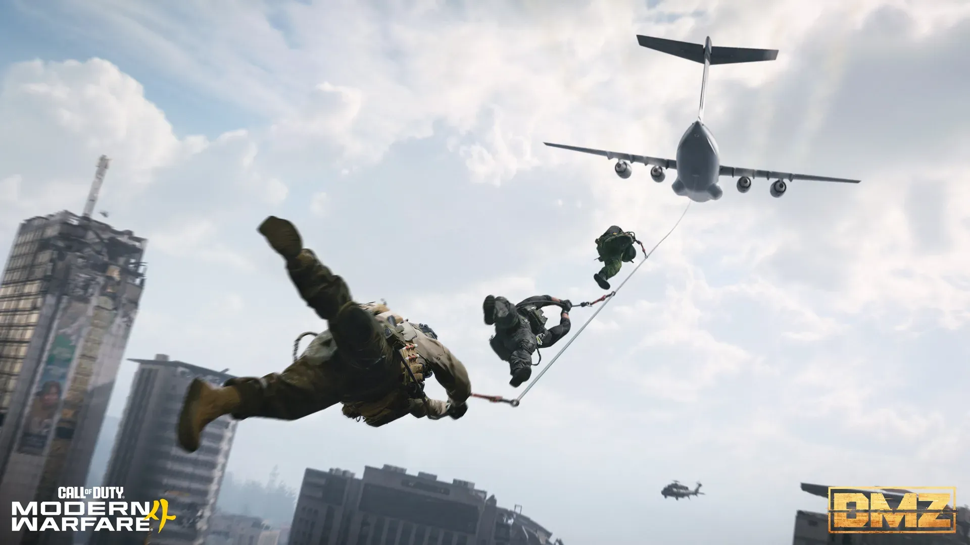 Operators freefalling from a cargo plane over Hajin's skyscrapers