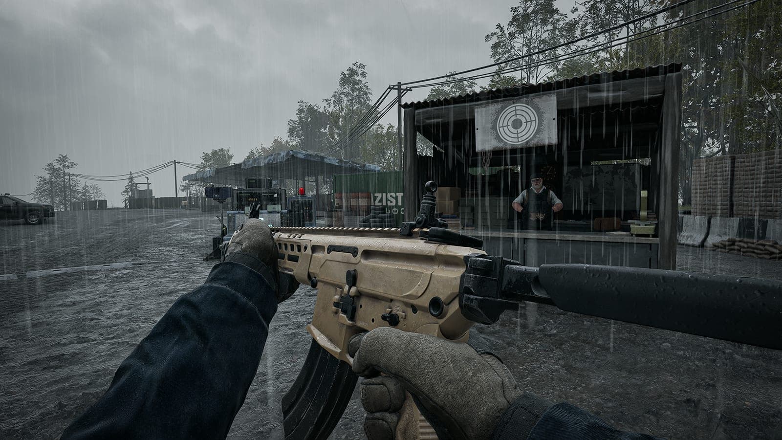 A tan suppressed TCX-SPR assault rifle held in first person beside a vendor stall in the rain