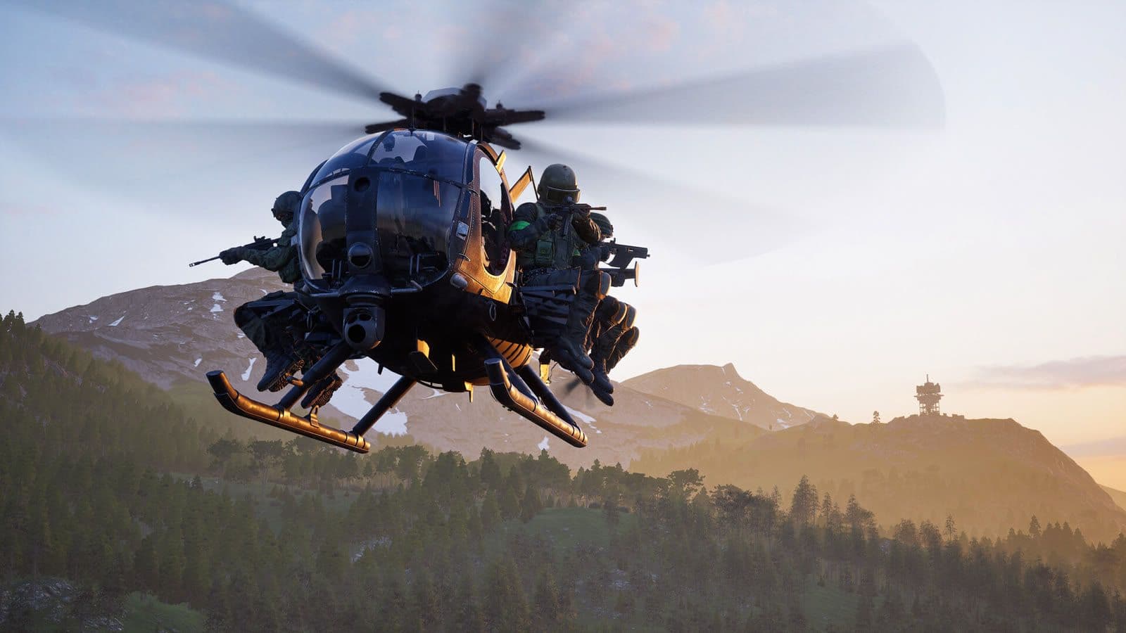 A Little Bird helicopter with soldiers on its side benches flies over hills at sunset in WARDOGS